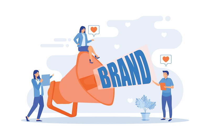 An illustration shows three people interacting with a large megaphone. One person stands on the megaphone with the text "BRAND" emerging. Another person holds a megaphone, and the third person holds a tablet, possibly to monitor google review bots. Hearts float above two people, indicating likes or favorites.