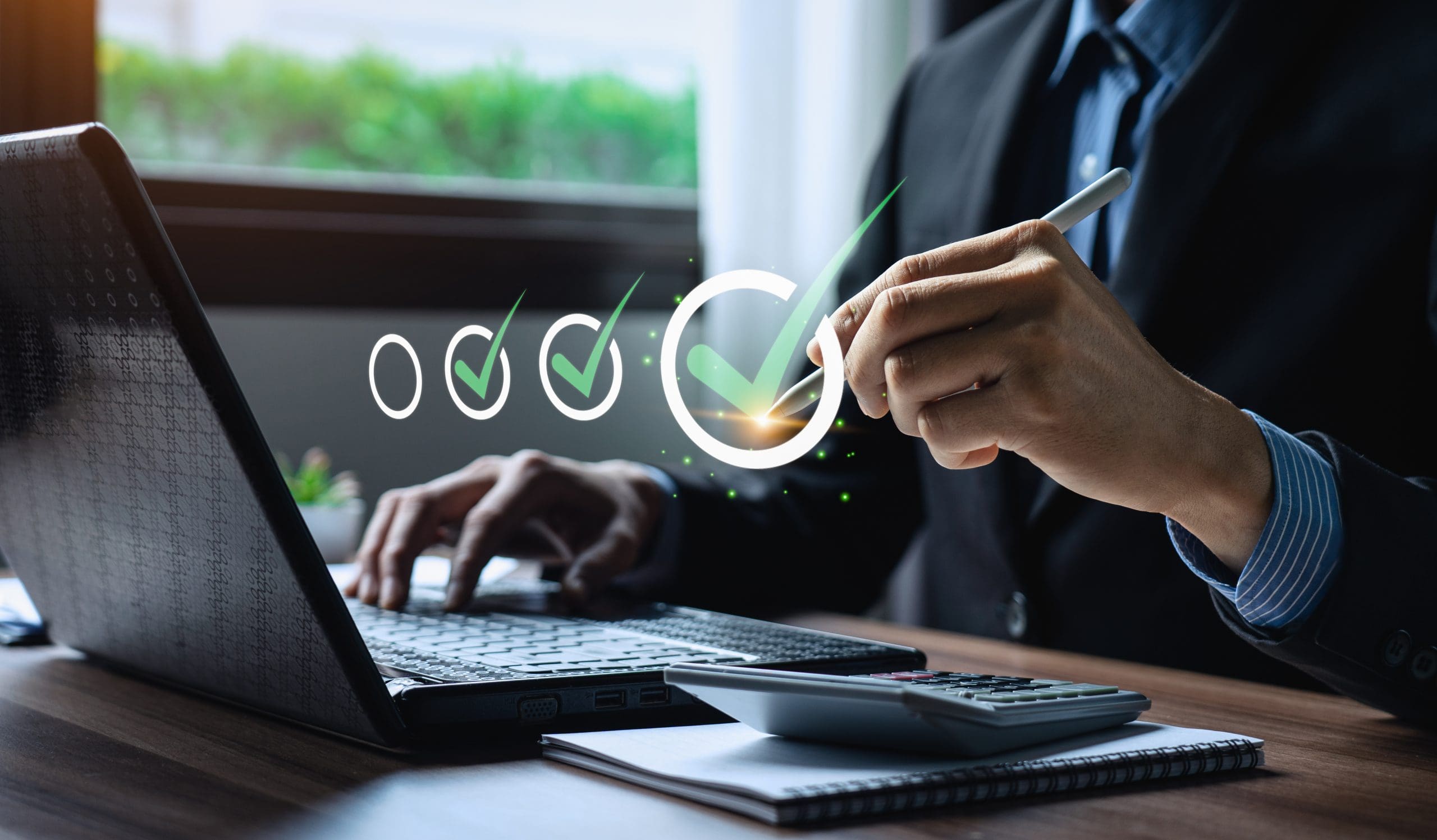 A person in business attire uses a laptop and digital stylus, conducting an online presence audit. Floating checkmarks, with one checked, symbolize completion. A window view with greenery enhances the scene.