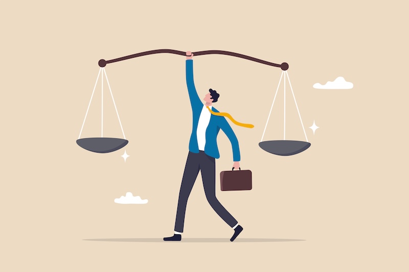 Illustration of a businessperson holding up a large balance scale with one hand, briefcase in the other, and yellow tie flying, symbolizing justice, fairness, balanced decision-making, and promoting online safety.