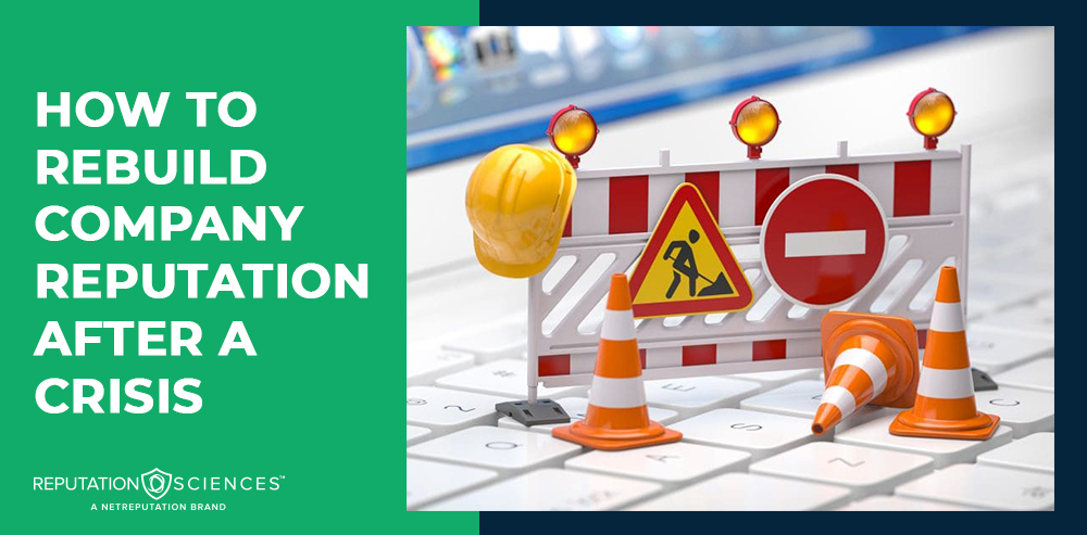 A keyboard adorned with construction barriers, cones, and a hard hat symbolizes the effort to rebuild company reputation. Text on the left reads "How to Rebuild Company Reputation After a Crisis.