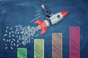 A man rides a rocket over a graph that shows an improving online reputation.